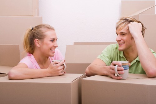 Efficient flat removals in Holborn showing careful handling of furniture and boxes