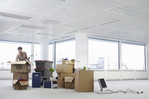 A worker assessing storage area risks and access routes